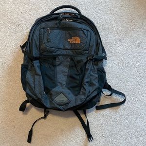 Gray and Pink North Face Backpack